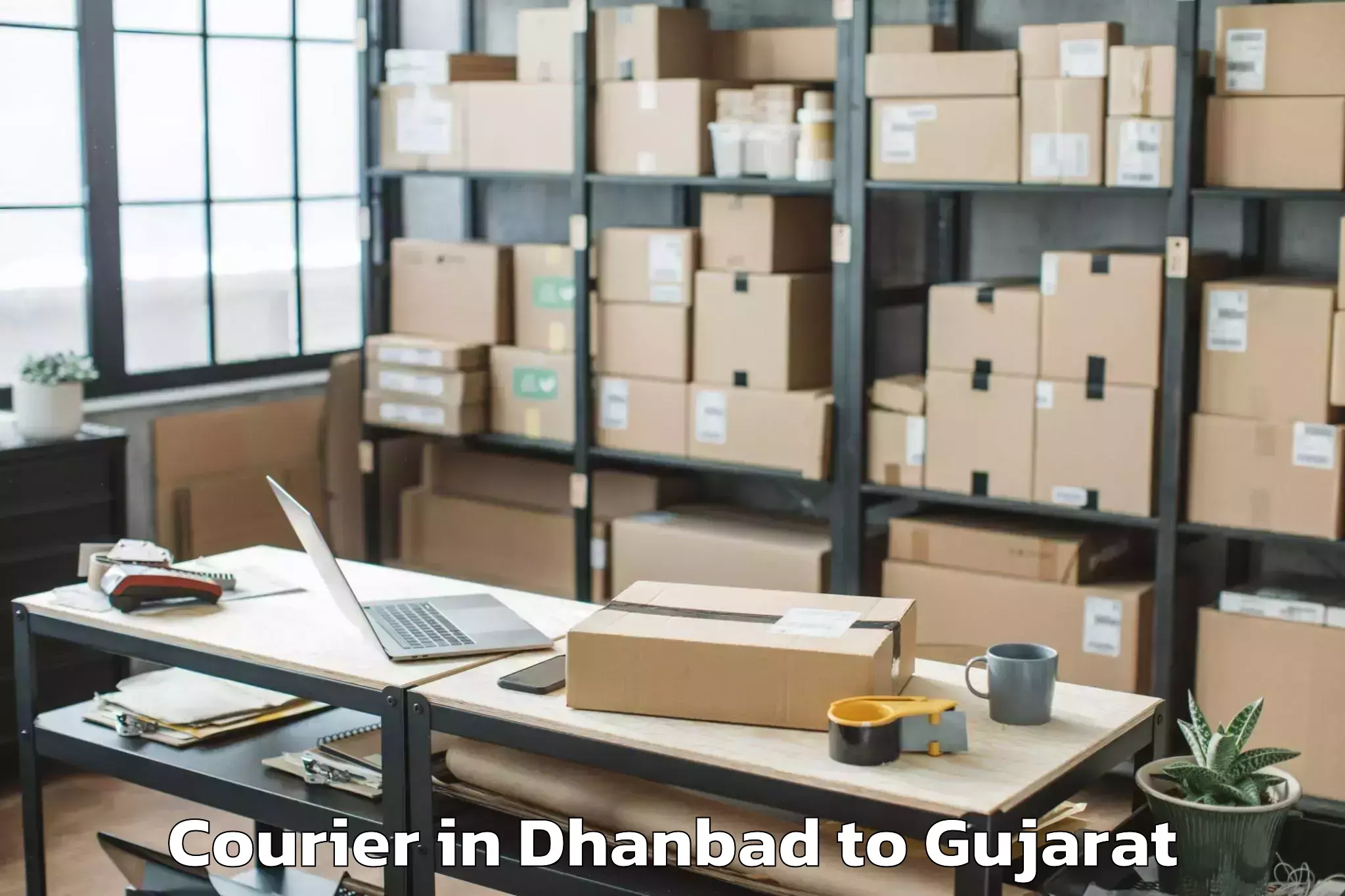 Easy Dhanbad to Bagasara Courier Booking